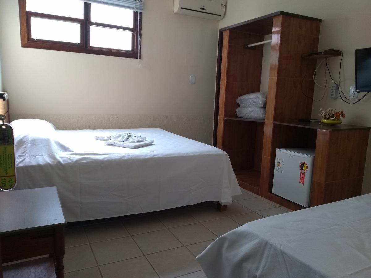 Quarto Triplo com Casa de Banho Privativa